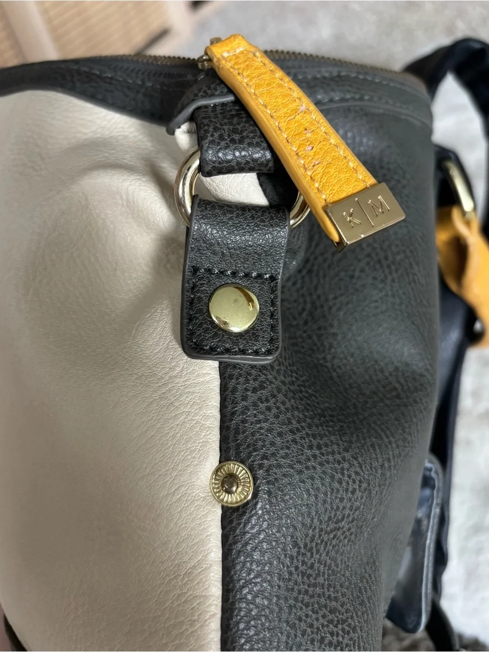 KELLY MORE Two-Tone Cream and Black   camera Backpack with Yellow Accents